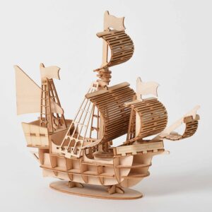 3D wooden puzzle sailing ship model kit — assembled wooden ship on white background